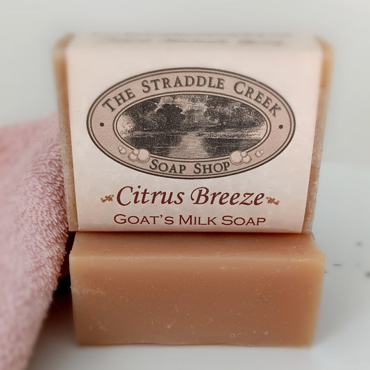 Bar of Citrus Breeze goat's milk soap from The Straddle Creek Soap Shop on a white background.