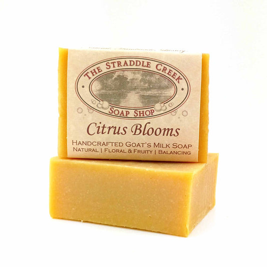 Citrus Blooms goat's milk soap labeled view showing the wrapped bar