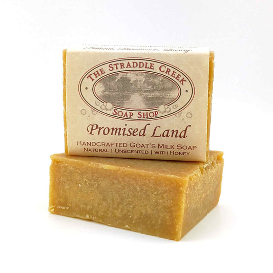 promised land unscented goat's milk soap with honey showing the straddle creek soap shop label